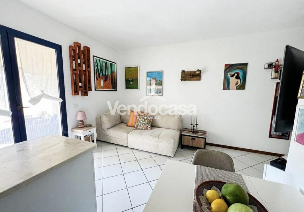 Bilocale arredato con terrazzo, box e doppia esposizione