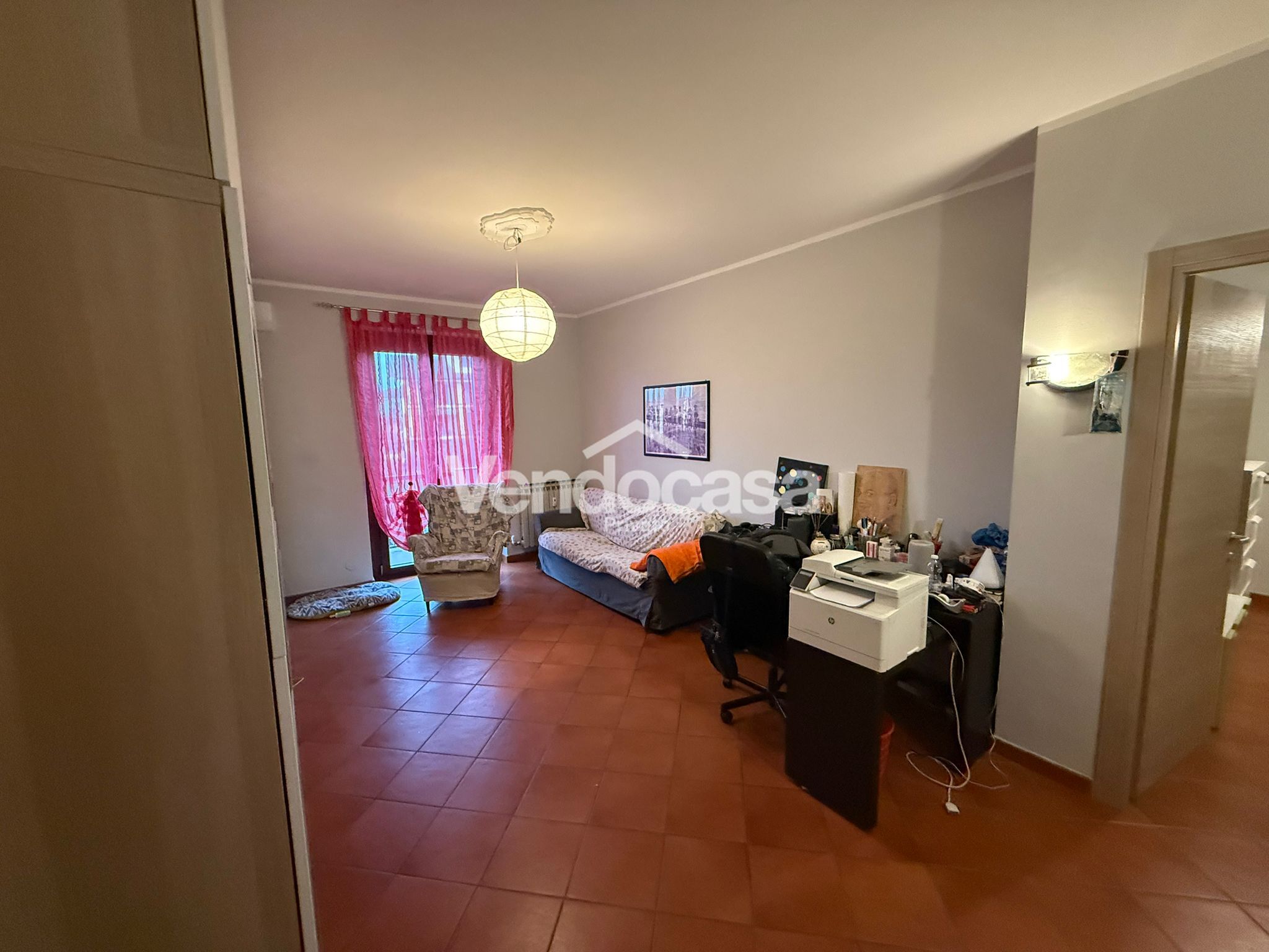 Appartamento di 110 mq con 2 camere da letto e 2 balconi, orto, cantina e garage a Cavallermaggiore