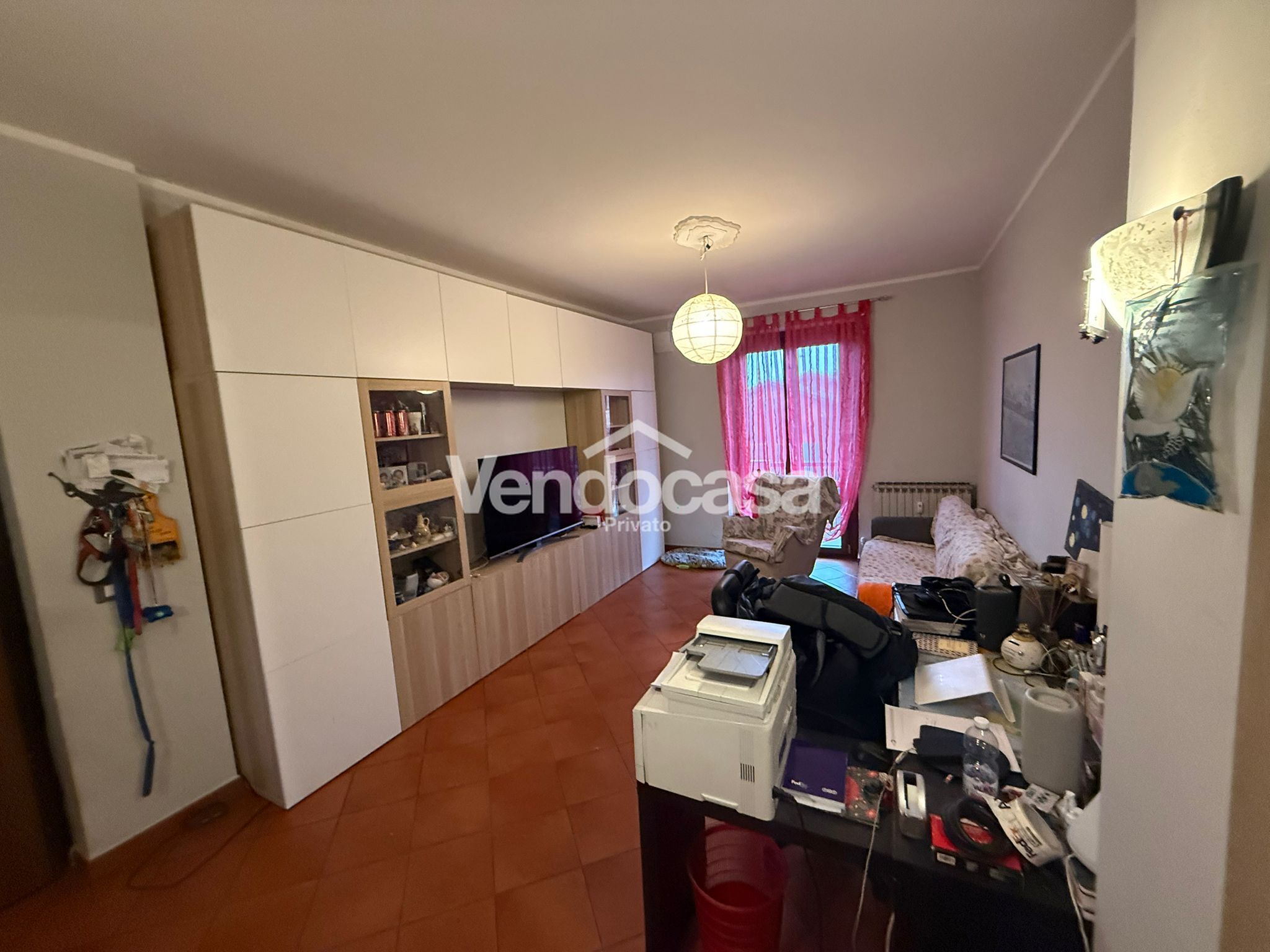 Appartamento di 110 mq con 2 camere da letto e 2 balconi, orto, cantina e garage a Cavallermaggiore
