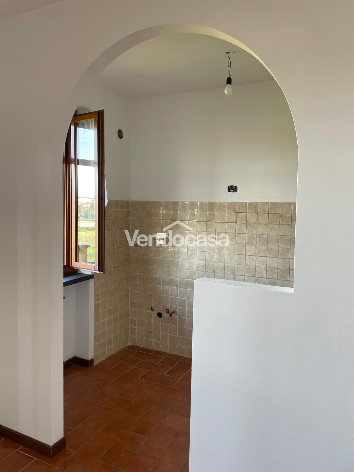 Appartamento con giardino privato e due posti auto in zona tranquilla