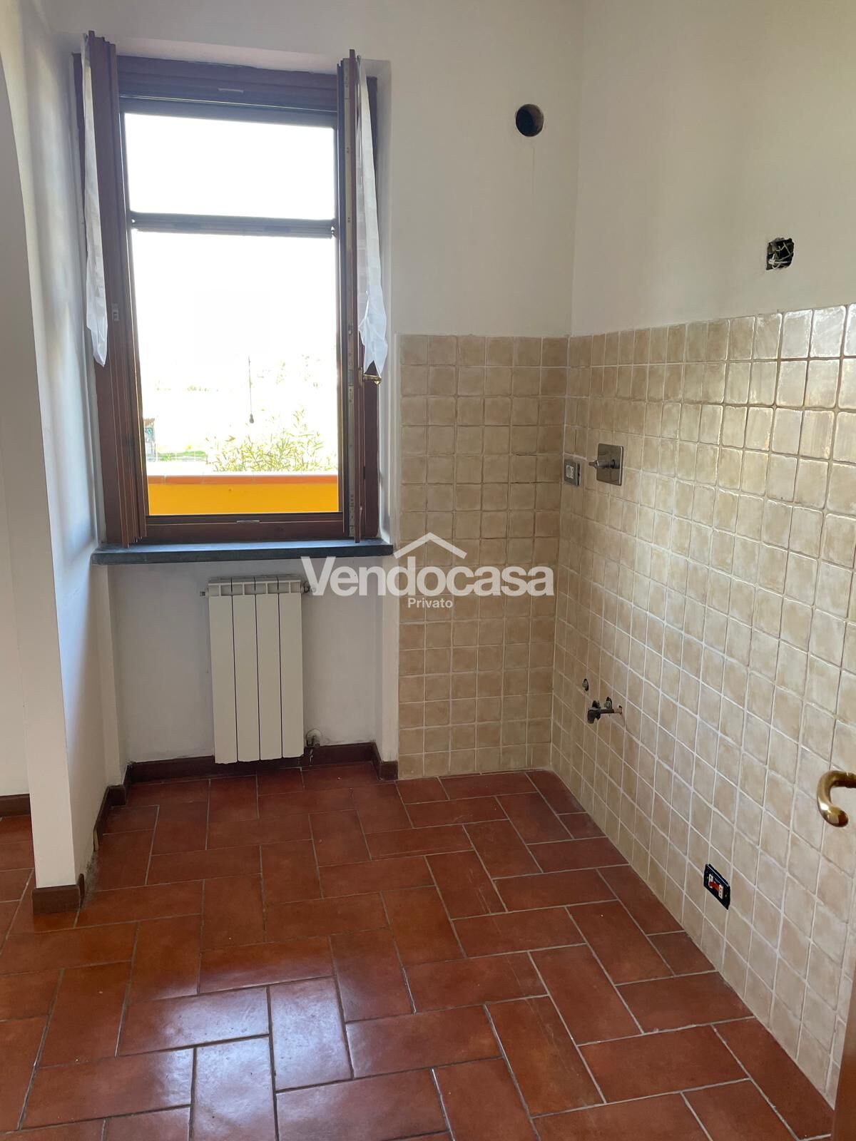 Appartamento con giardino privato e due posti auto in zona tranquilla